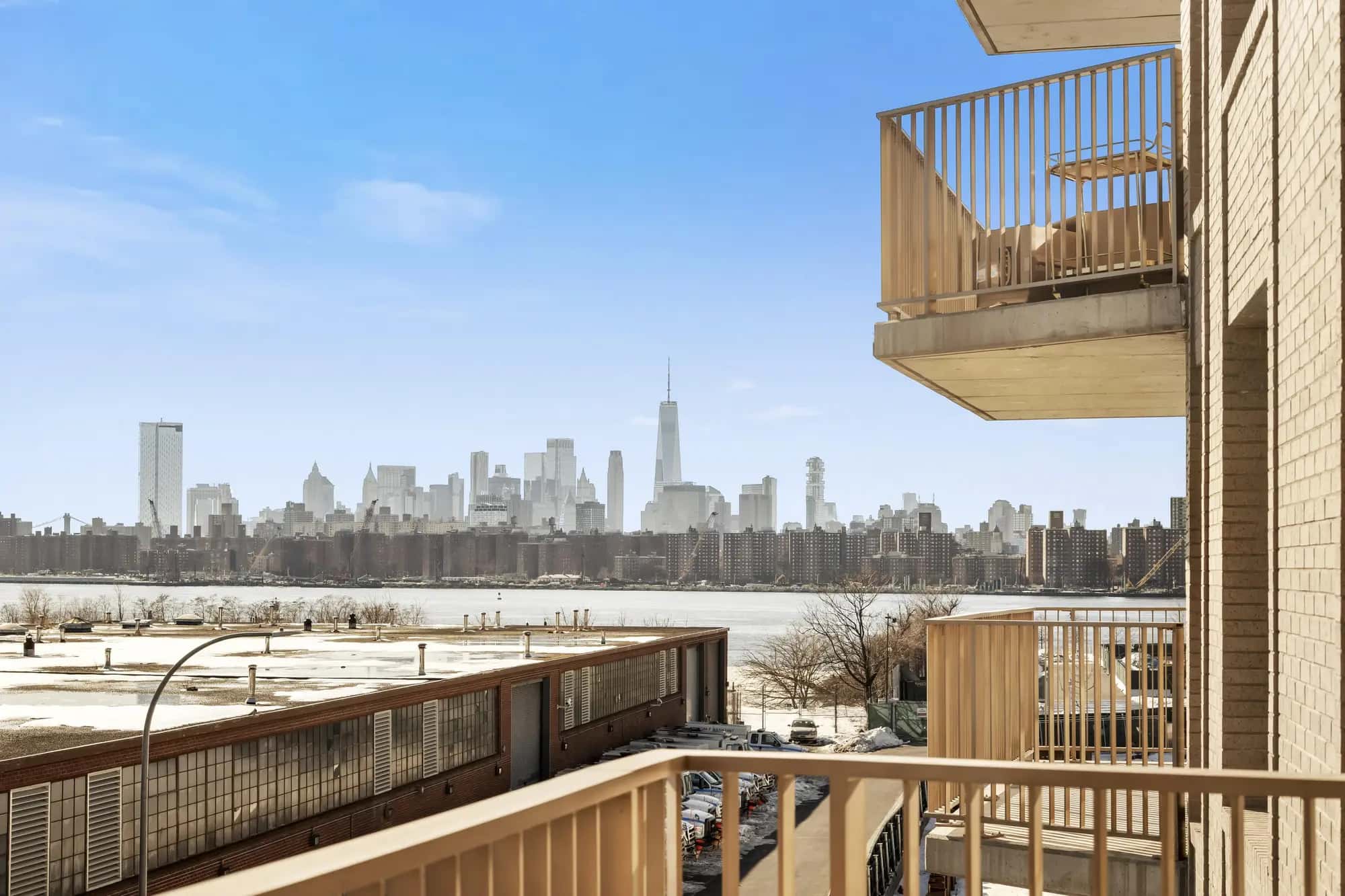 Lower Manhattan skyline seen across the water from a Waypost Brooklyn residence